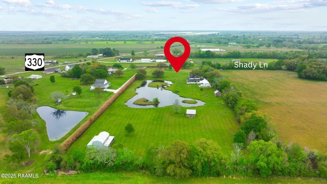 aerial view featuring a water view and a rural view