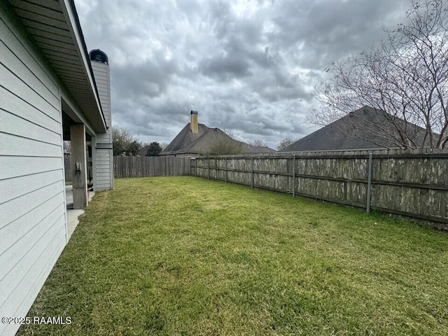 114 Sandhill Crane Dr, Lafayette, LA 70508 - view of yard with a fenced backyard