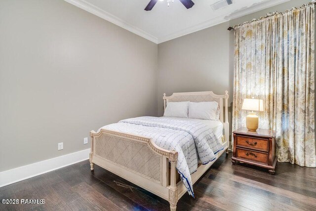 311 Oats Dr, Lafayette, LA 70508 - bedroom featuring crown molding, wood finished floors, baseboards, and a ceiling fan