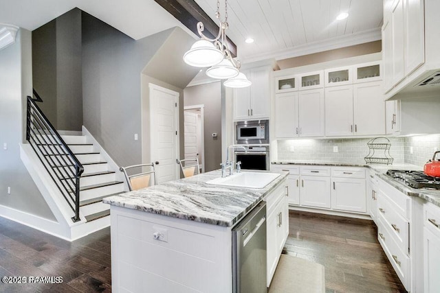 311 Oats Dr, Lafayette, LA 70508 - kitchen featuring stainless steel appliances, dark wood finished floors, white cabinetry, light stone countertops, and glass insert cabinets