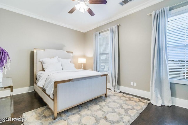 311 Oats Dr, Lafayette, LA 70508 - bedroom featuring wood finished floors, crown molding, baseboards, and a ceiling fan
