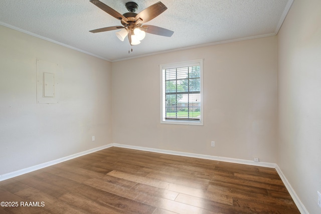 1406 S Patout St, New Iberia, LA 70560 - unfurnished room featuring crown molding, a ceiling fan, a textured ceiling, and dark wood-type flooring