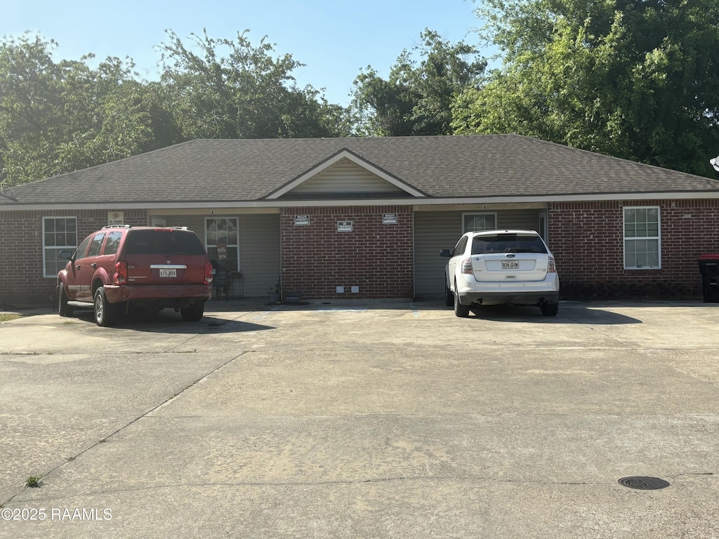 218 Frank St Unit A & B, Lafayette, LA 70501 - single story home with brick siding and roof with shingles