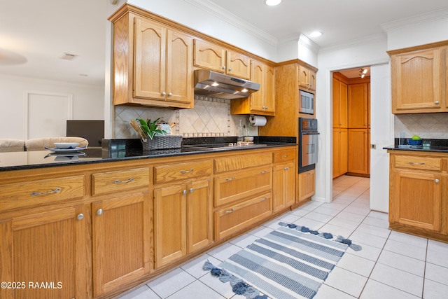 200 Sandager Ave, Jeanerette, LA 70544 - kitchen featuring light tile patterned flooring, under cabinet range hood, black appliances, and decorative backsplash