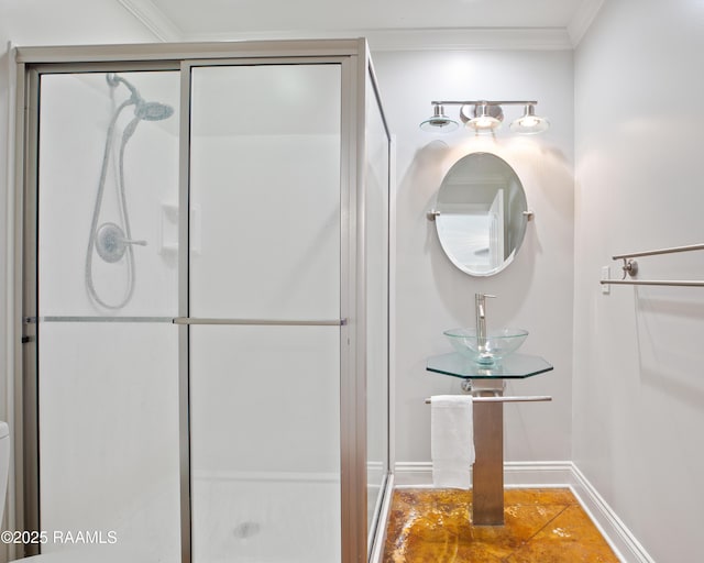200 Sandager Ave, Jeanerette, LA 70544 - full bathroom with ornamental molding, baseboards, a sink, and a stall shower