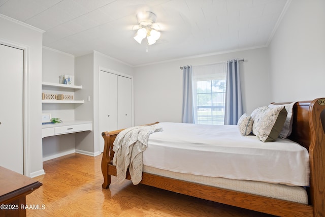 200 Sandager Ave, Jeanerette, LA 70544 - bedroom with crown molding, a closet, light wood finished floors, and ceiling fan