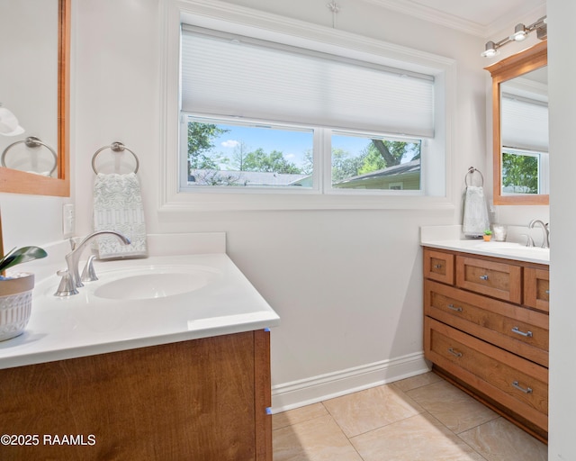 200 Sandager Ave, Jeanerette, LA 70544 - bathroom with ornamental molding, baseboards, vanity, and tile patterned flooring