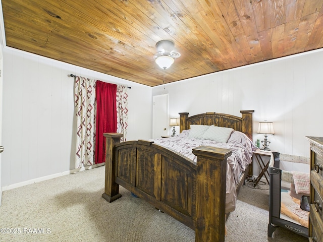 bedroom with baseboards, carpet, and wood ceiling
