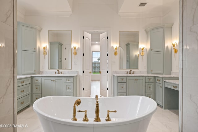 207 Sunset Palm Ct, Youngsville, LA 70592 - full bathroom with marble finish floors, vanity, and a freestanding tub