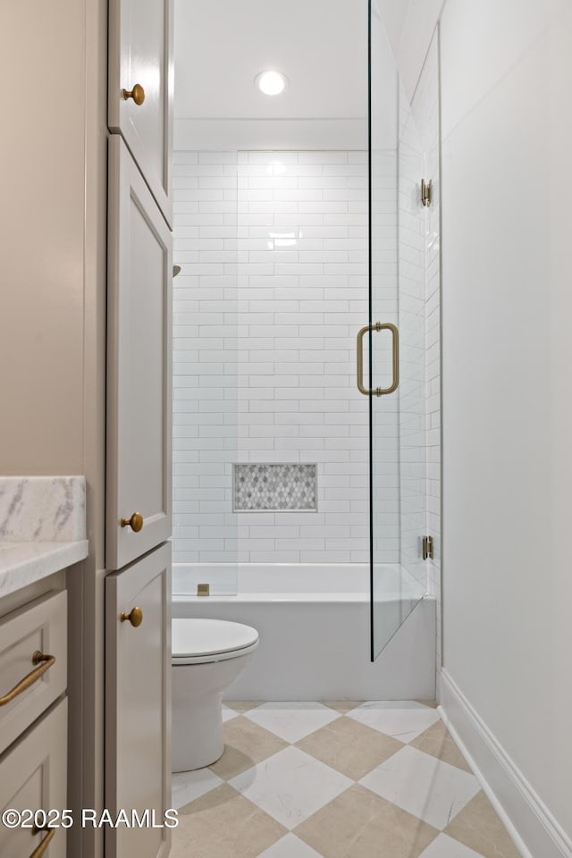 207 Sunset Palm Ct, Youngsville, LA 70592 - bathroom featuring vanity, combined bath / shower with glass door, and recessed lighting