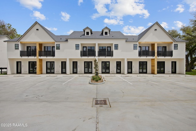 1510 Kaliste Saloom Unit 201, Lafayette, LA 70508 - view of building exterior with uncovered parking