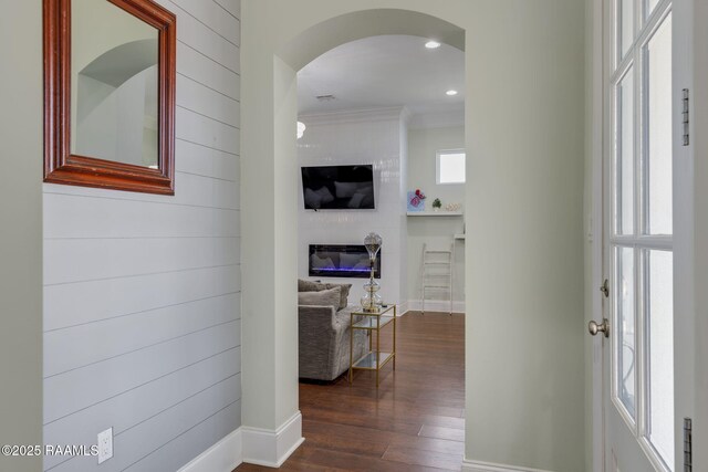 208 Woodstone Dr, Lafayette, LA 70508 - hallway with baseboards, arched walkways, dark wood-style floors, crown molding, and recessed lighting