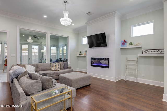 208 Woodstone Dr, Lafayette, LA 70508 - living room featuring visible vents, plenty of natural light, dark wood-style flooring, recessed lighting, and a large fireplace