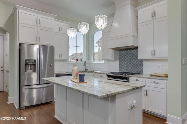 208 Woodstone Dr, Lafayette, LA 70508 - kitchen with custom exhaust hood, appliances with stainless steel finishes, dark wood-style flooring, and white cabinetry