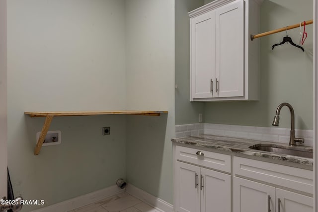 208 Woodstone Dr, Lafayette, LA 70508 - clothes washing area featuring baseboards, electric dryer hookup, cabinet space, marble finish floor, and a sink
