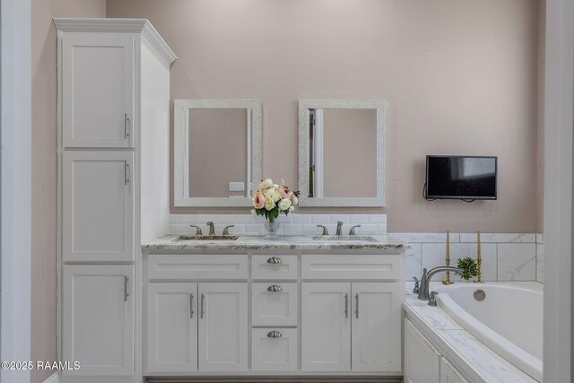 208 Woodstone Dr, Lafayette, LA 70508 - full bath featuring a sink, a bath, and double vanity