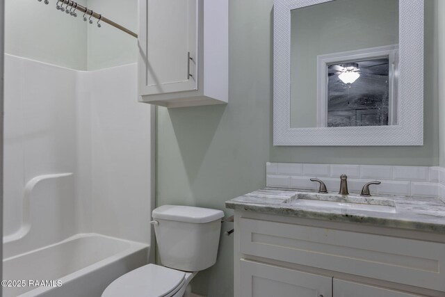 208 Woodstone Dr, Lafayette, LA 70508 - full bathroom featuring washtub / shower combination, vanity, and toilet