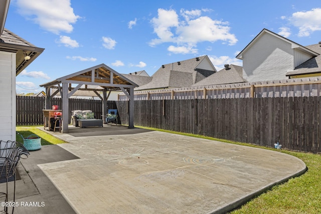 208 Woodstone Dr, Lafayette, LA 70508 - view of patio featuring a gazebo and a fenced backyard