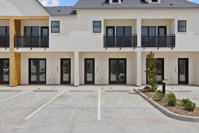 1510 Kaliste Saloom Unit 203, Lafayette, LA 70508 - view of building exterior with uncovered parking