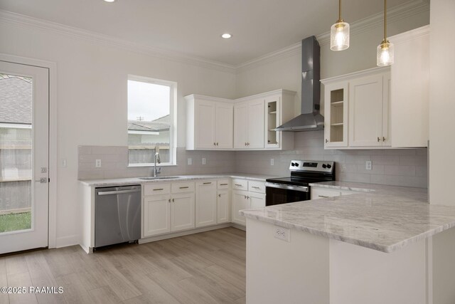 1510 Kaliste Saloom Unit 203, Lafayette, LA 70508 - kitchen with a sink, wall chimney range hood, appliances with stainless steel finishes, and plenty of natural light