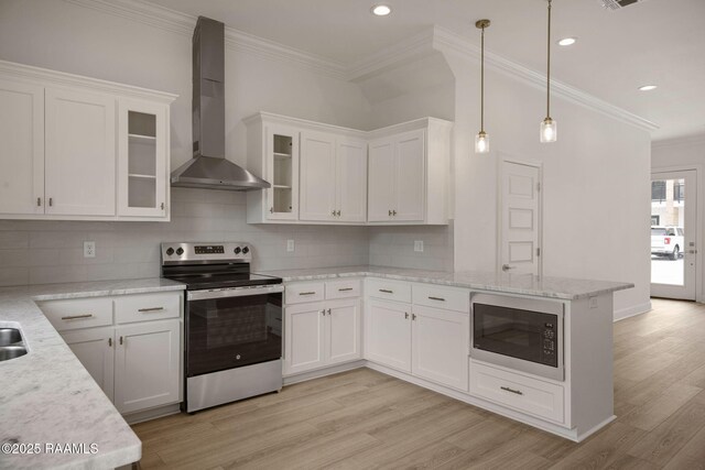 1510 Kaliste Saloom Unit 203, Lafayette, LA 70508 - kitchen with a peninsula, white cabinets, built in microwave, wall chimney exhaust hood, and stainless steel range with electric cooktop