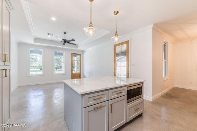 122 Rena Dr Unit A, Lafayette, LA 70503 - kitchen with finished concrete floors, crown molding, stainless steel microwave, and a ceiling fan