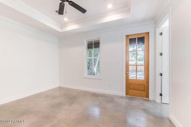 122 Rena Dr Unit A, Lafayette, LA 70503 - spare room featuring baseboards, a ceiling fan, concrete floors, and a raised ceiling