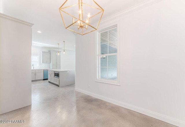 122 Rena Dr Unit A, Lafayette, LA 70503 - unfurnished dining area with concrete flooring, an inviting chandelier, recessed lighting, baseboards, and ornamental molding