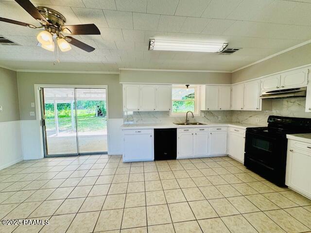 336 Harmon Ln, Opelousas, LA 70570 - kitchen featuring black appliances, a sink, under cabinet range hood, ornamental molding, and light countertops