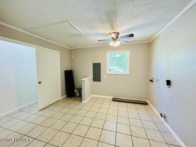 336 Harmon Ln, Opelousas, LA 70570 - unfurnished room with electric panel, crown molding, a ceiling fan, light tile patterned floors, and baseboards