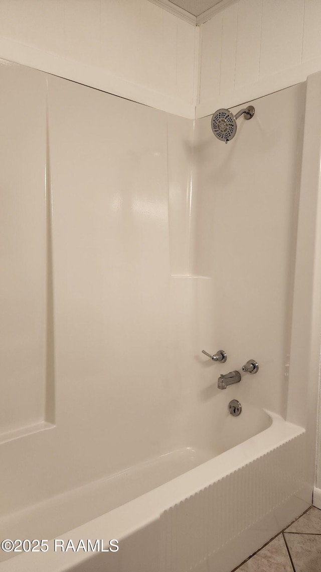 336 Harmon Ln, Opelousas, LA 70570 - bathroom with shower / washtub combination and tile patterned flooring