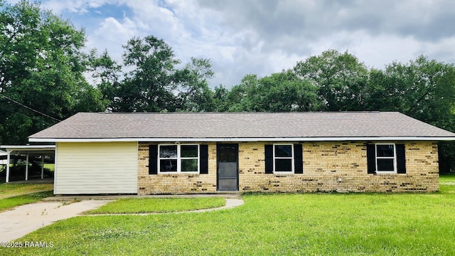 336 Harmon Ln, Opelousas, LA 70570 - ranch-style home featuring a front lawn and brick siding
