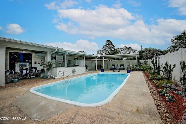 view of swimming pool with a patio, a fenced backyard, and a fenced in pool