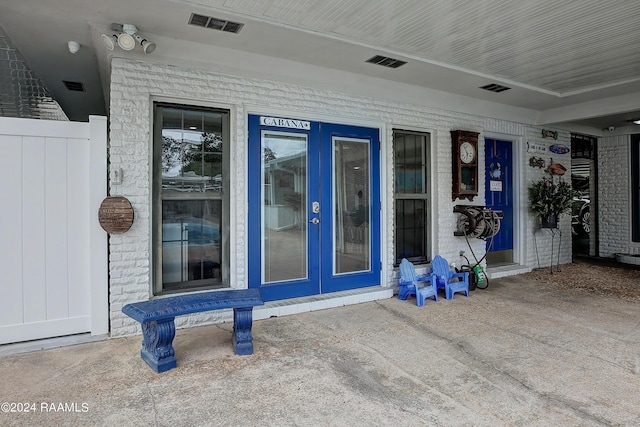 entrance to property with visible vents