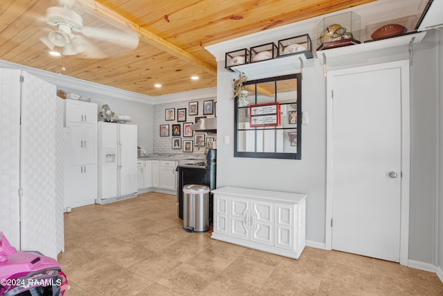 kitchen with wooden ceiling, white fridge with ice dispenser, light countertops, ceiling fan, and under cabinet range hood