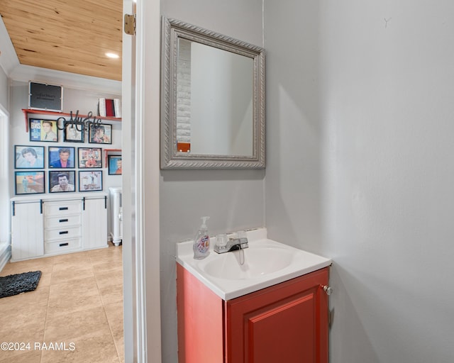 bathroom featuring tile patterned floors, wooden ceiling, and vanity