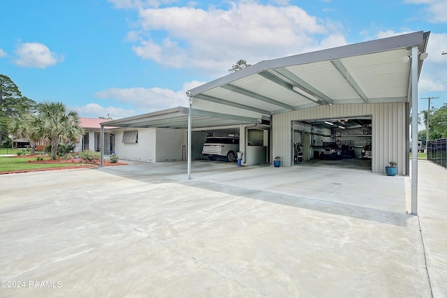 view of car parking featuring a carport and driveway