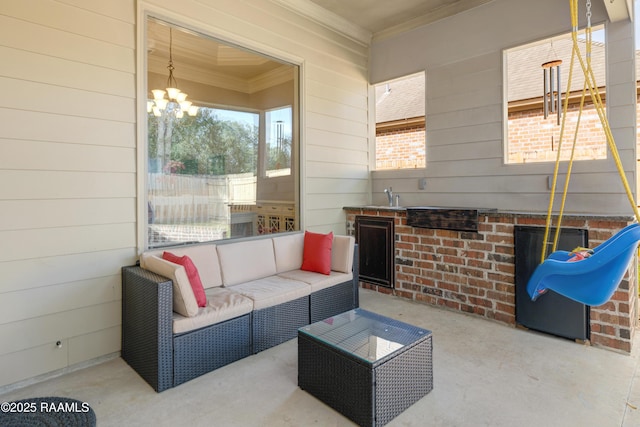 view of patio with an outdoor kitchen and an outdoor hangout area