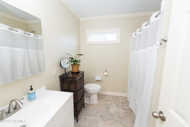 full bathroom with vanity, baseboards, crown molding, and toilet