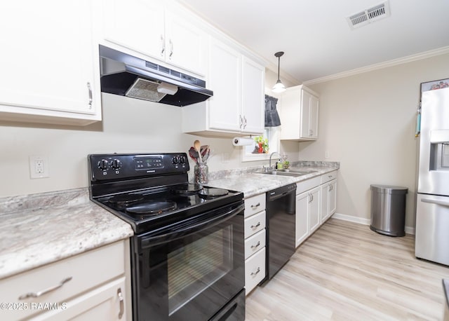 kitchen featuring visible vents, white cabinets, a sink, under cabinet range hood, and black appliances