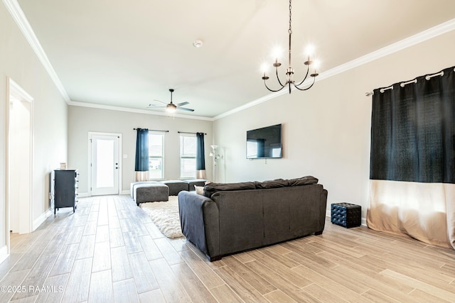 living area with light wood-style floors, crown molding, baseboards, and ceiling fan with notable chandelier