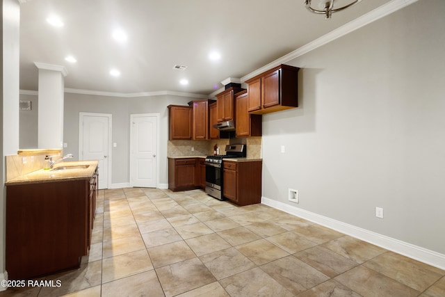 kitchen featuring tasteful backsplash, ornamental molding, visible vents, stainless steel range with gas stovetop, and a sink
