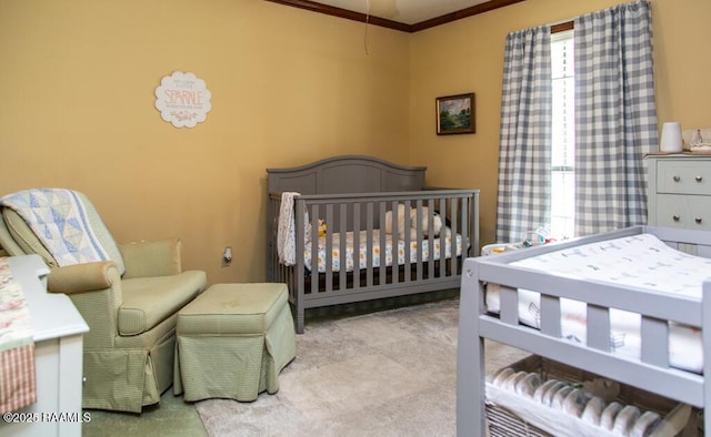 carpeted bedroom featuring crown molding
