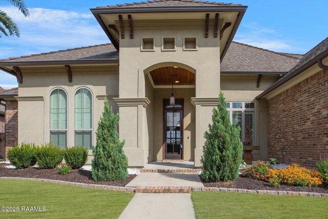 106 Rue De Chambery, Broussard, LA 70518 - entrance to property featuring roof with shingles and stucco siding