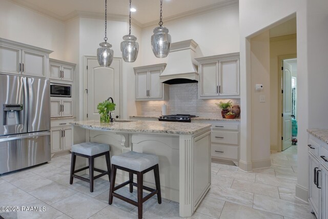 106 Rue De Chambery, Broussard, LA 70518 - kitchen with custom exhaust hood, tasteful backsplash, a breakfast bar, crown molding, and stainless steel appliances