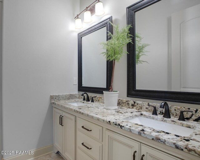 106 Rue De Chambery, Broussard, LA 70518 - bathroom featuring a sink, baseboards, and double vanity
