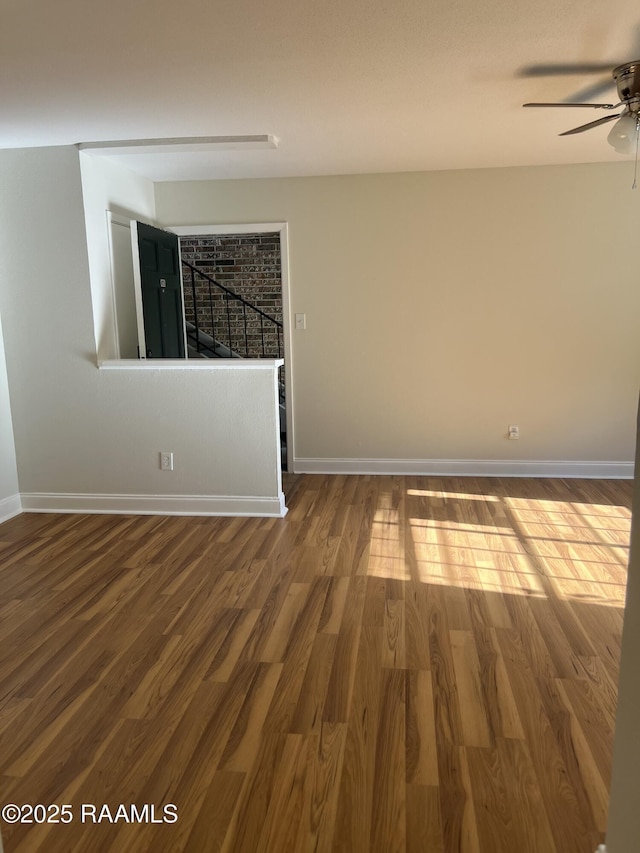 3121 Johnston St Unit 143, Lafayette, LA 70503 - empty room featuring ceiling fan and wood finished floors