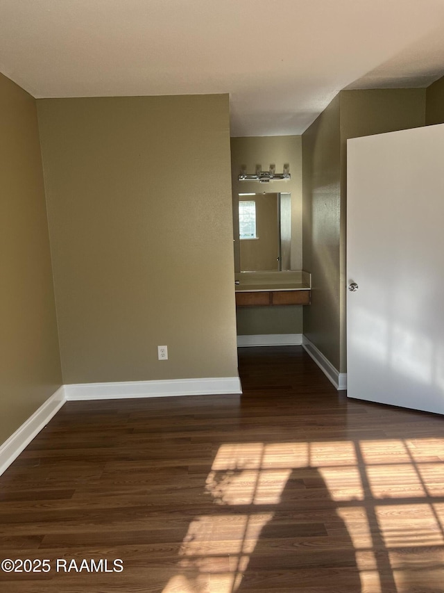 3121 Johnston St Unit 143, Lafayette, LA 70503 - empty room with wood finished floors and baseboards