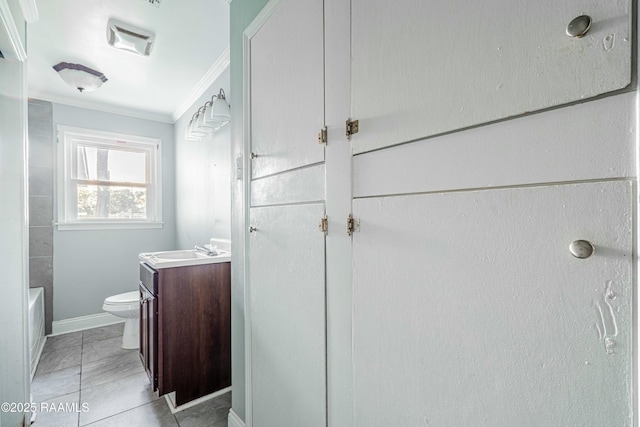 full bathroom with vanity, baseboards, walk in shower, crown molding, and toilet