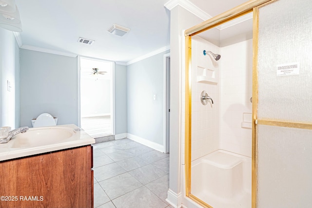 bathroom with a shower stall, visible vents, and ornamental molding